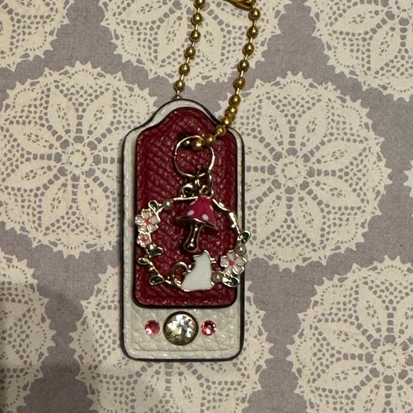 Coach Handbags - Coach Custom Hangtag Cat and Flowers
